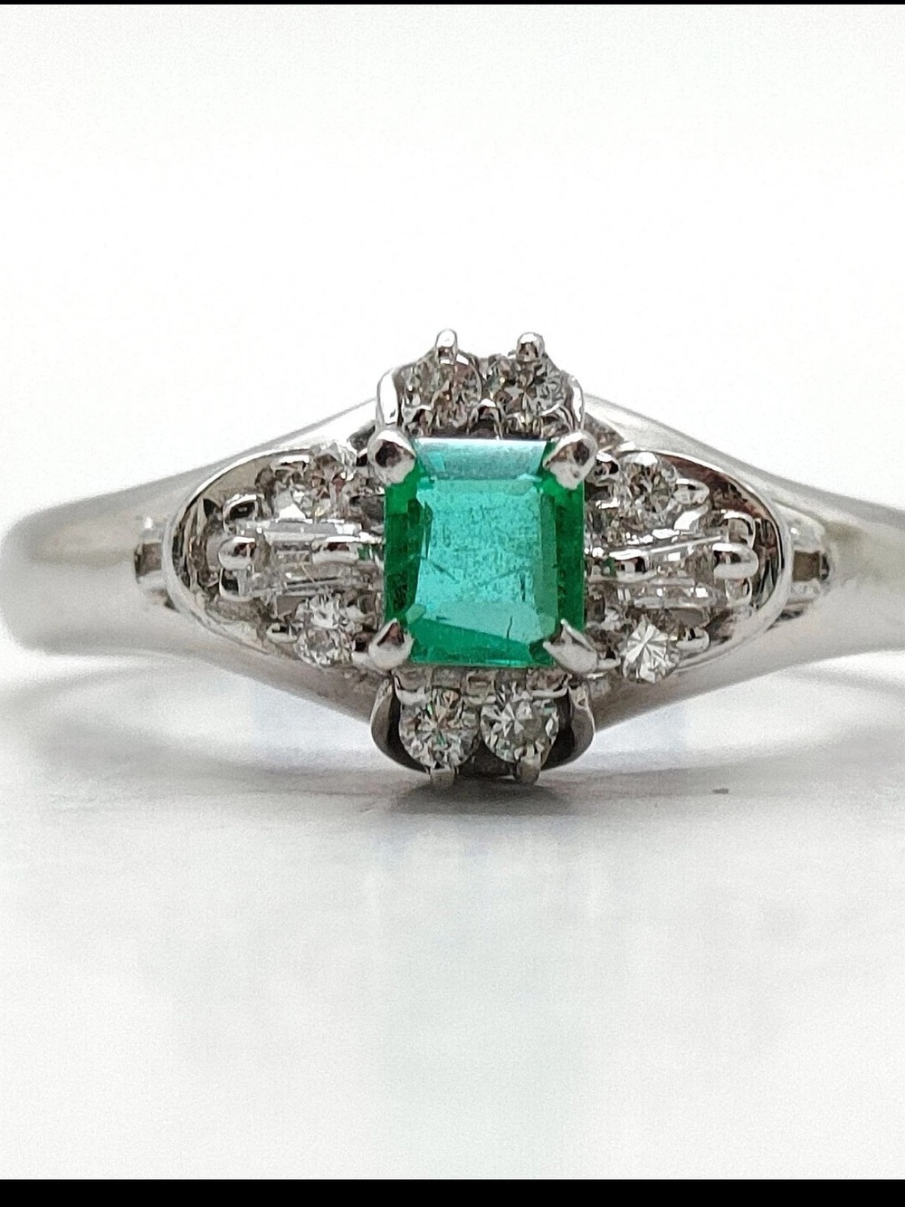 Natural Emerald and Diamond Halo Ring in Platinum Sz5.5